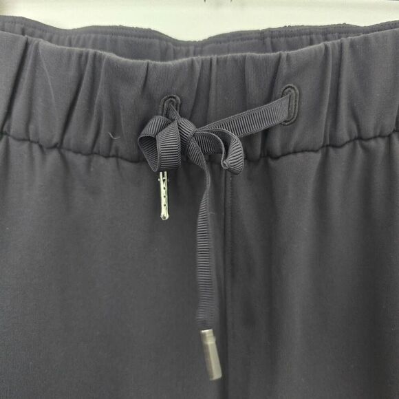 Lululemon On The Fly 7/8 Crop Ankle Pants Women's 4 Black Drawstring Stretch - Picture 3 of 7